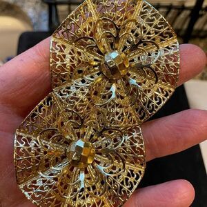 Vintage gold tone metal clip on flower earrings